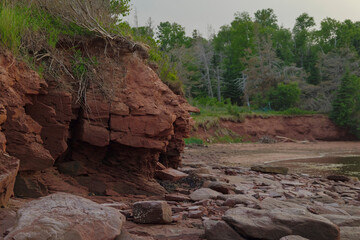 the red coastal cliff in prince edward island Canada. High quality photo