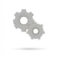Two gray, metallic gears interlocked, slightly 3D, cast shadow beneath, simple design on white background