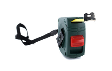 Detailed view of a green tape measure, ready for precise measurements on a white backdrop.