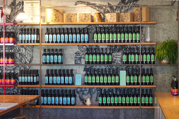 Shelves of t gourmet goods framed by display in a modern tasting boutique