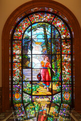 Glass window with religious art