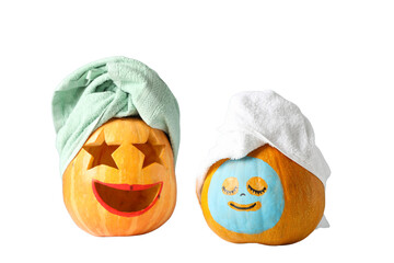 Two expressive pumpkins in towels, isolated on white, PNG