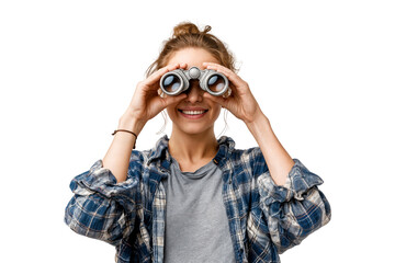Smiling young woman looking through binoculars isolated on transparent background with curious and adventurous expression