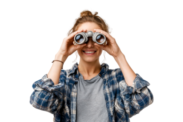 Smiling young woman looking through binoculars isolated on transparent background with curious and adventurous expression