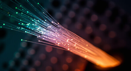 "Fiber optic cable glowing in macro. Abstract technology background for data and internet themes."


