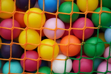 colorful balls in a net children
