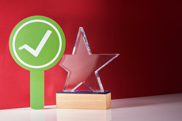 green circle with check mark and crystal trophy