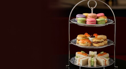 Indulge in a delightful afternoon tea with delectable macarons, savory scones, and elegant finger sandwiches.