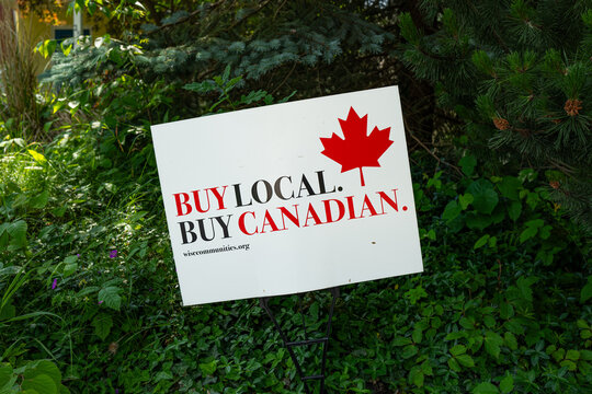 &ldquo;A 'Buy Local, Buy Canadian' sign displayed in a residential yard in Stratford, Ontario promotes grassroots support for Canadian businesses amid ongoing conversations about economic self-reliance.