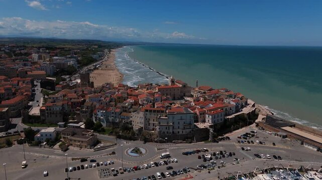 WIde orbit of of Termoli coastline. Harbor, old town, cathedral, sea and beaches in the distance.