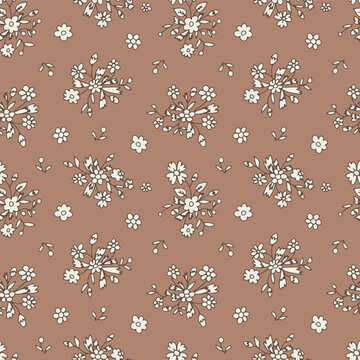 Monochrome ditsy floral seamless pattern on brown background. Hand drawn vintage backdrop with tiny flower bouquets. Cottage core texture with sketchy blooms and leaves.