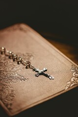 Obraz premium Close-up of rosary beads on bible
