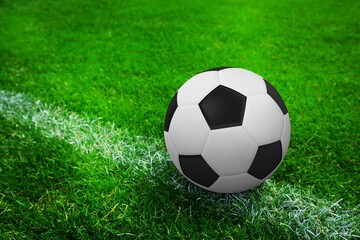 Fototapeta premium Soccer ball on marking line