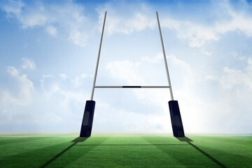 Flat design illustration is showing rugby goalposts standing on grass field under cloudy blue sky