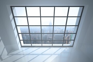 Room with large window showing city
