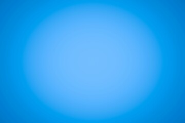 Circular blue gradient is spreading across flat design, showing light center fading into dark edges
