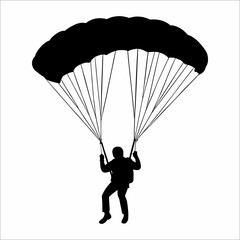 silhouette of a person parachuting