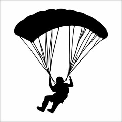 silhouette of a person parachuting