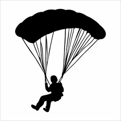 silhouette of a person parachuting