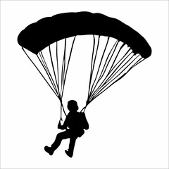 silhouette of a person parachuting