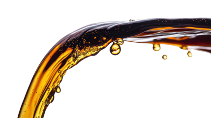 Pouring dark liquid stream with droplets