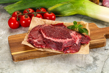 Raw beef cheeks cut for cooking