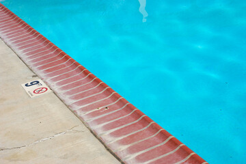 Swimming pool deck and water