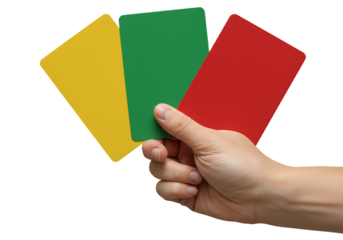 Hand holding three colored cards symbolizing stop, warning, and go against a black background