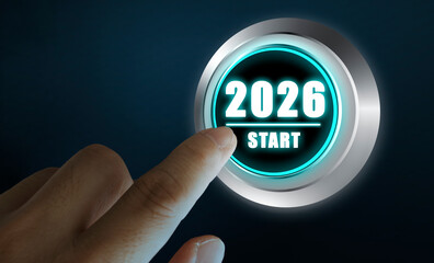Finger pressing start button with glowing 2026 text on digital screen, concept of new beginning and fresh future
