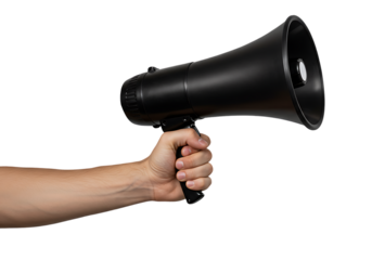 Black megaphone held in human hand isolated against a solid black background