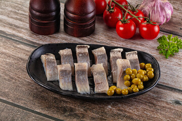 Slided marinated salted herring fillet