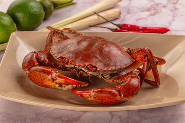 Gourmet steamed crab served lime