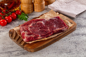 Gourmet raw rib eye steak