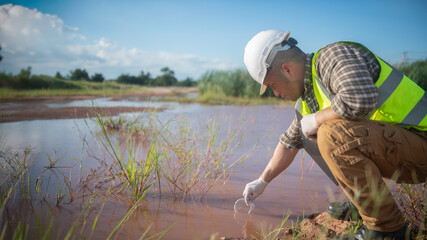 An environmental engineer examines the abundance of natural water sources and ecosystems