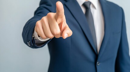 Businessman gesturing towards a digital display of financial graphs and growth indicators, designed for text integration