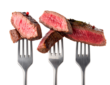 Slices of beef steak on vintage fork Isolated on Transparent or White Background