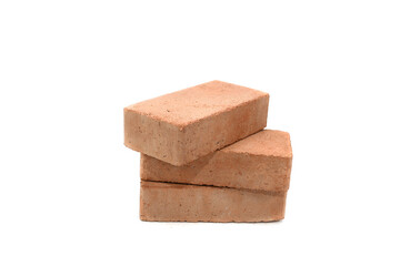 Red bricks isolated on white background. Solid clay bricks used for construction.