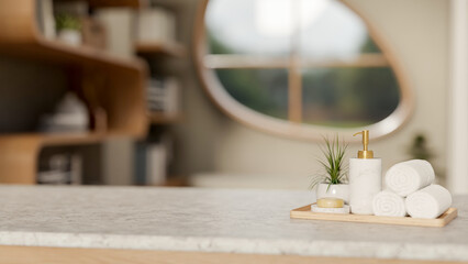 Spa towel and soap with lotion in pump bottle aside potted plant on wooden plate atop marble counter
