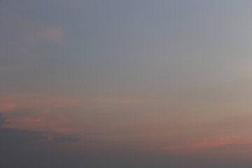 Serene Twilight Sky with Subtle Hues of Blue, Pink, and Orange Creating a Peaceful Atmosphere at Dusk Overlooking the Tranquil Horizon in Nature’s Beauty