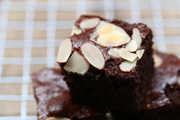 Deliciously Rich Brownie with Almonds on a Cooling Rack, Perfectly Baked Treat for Events, Parties, or Everyday Indulgence, Moist and Decadent Chocolate Dessert