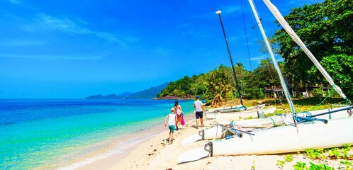 family on the Khlong Prao beach on Ko Chang island