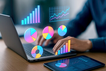 Person using laptop with holographic charts and graphs showing data analysis business analytics financial report colorful pie charts bar graphs