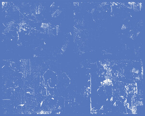 A heavily damaged blue surface. The texture features white imperfections and wear, creating a distressed, weathered pattern with visible flaws and scrapes across its surface.