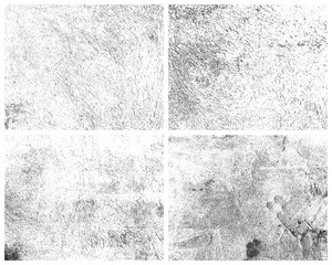 Four distressed overlay textures create a grunge effect, offering a raw and authentic surface aesthetic, perfect for adding depth to designs with textured effects.