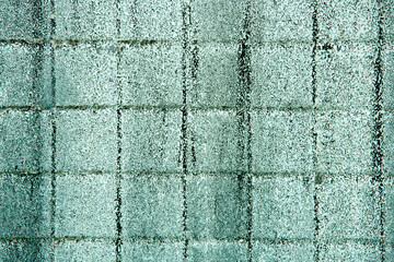 Textured Green Wall Surface Showing Weathered Concrete Patterns