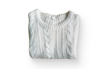 A neatly folded white cable-knit sweater on a plain background.