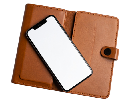  Top view of modern smartphone resting diagonally on a textured brown leather folio – transparent