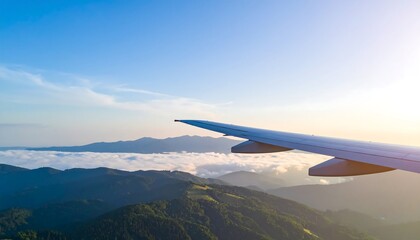 Fototapeta premium Airplane wing view over mountain landscape.