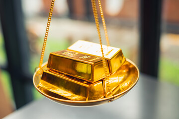 Gold with balance scale. Money management, financial plan, time value of money, Gold value and price concept. 