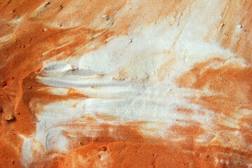 Abstract View of Textured Blend of Orange and White Sands Creating a Unique Pattern, Top View.